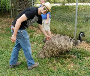 I don't any pictures of me and Ron, so here's one of me and an emu. Close enough, right?